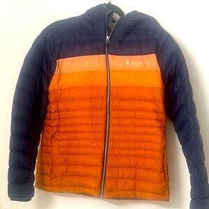 Coat worn a handful of times. Blue, pink and orange like a beautiful sunset